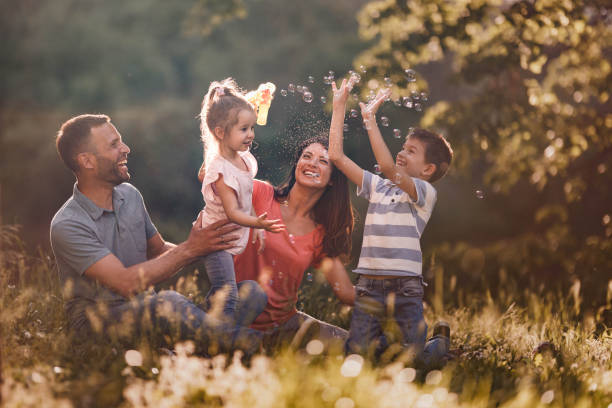 istock Family's fun with bubbles in nature! 1324653199