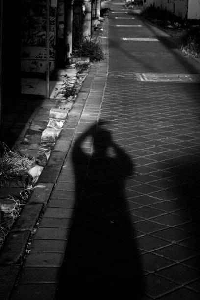 istock shadow in the street 1324656369
