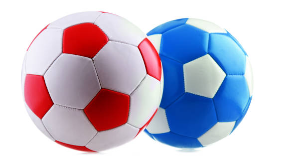 istock Two leather soccer balls isolated on white 1324656417