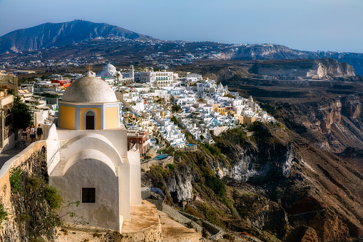 View of the city of Thera on beautiful Santorini, Greece, with small chapel