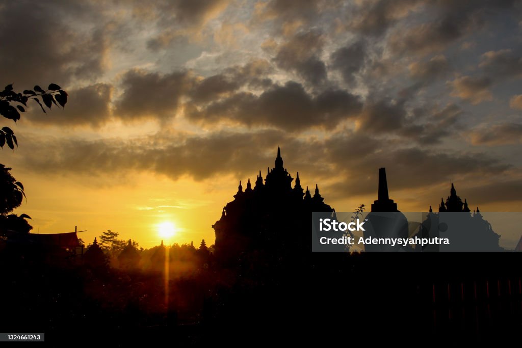 The Plaosan temple at sunrise Agricultural Field Stock Photo