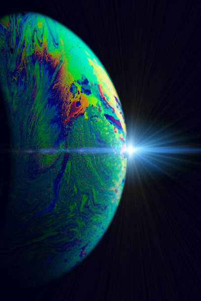 istock Abstract background space. Globe planet earth in galaxy universe with abstract sun on black background. Comet, asteroid, meteorite in fantasy galaxy. 1324663234