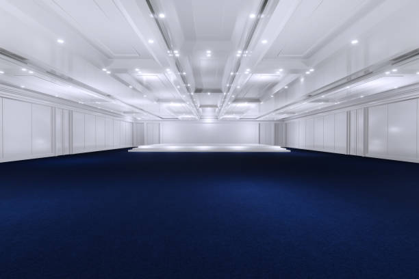 istock Empty convention hall center with stage.The backdrop for exhibition stands,booth elements. Meeting room for the conference.Big Arena for entertainment,concert,event. ballroom.3d render. 1324667347