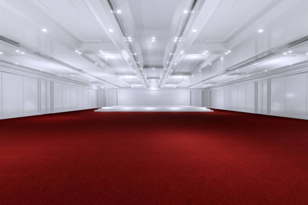 istock Empty convention hall center with stage.The backdrop for exhibition stands,booth elements. Meeting room for the conference.Big Arena for entertainment,concert,event. ballroom.3d render. 1324667634