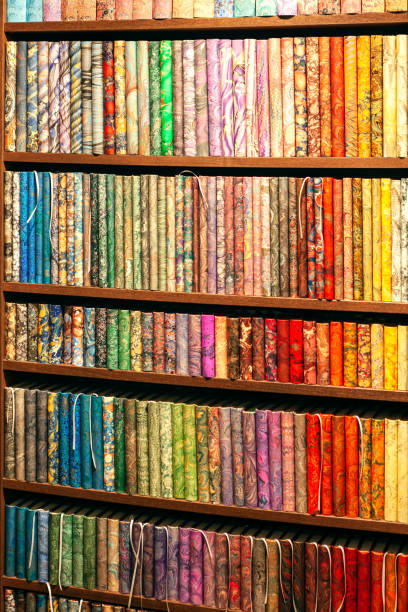 istock Colorful wallpaper rolls in the store 1324670459