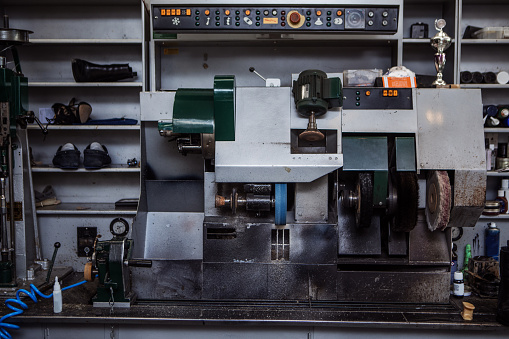 The inside of a shoemaker store and cobbler tools