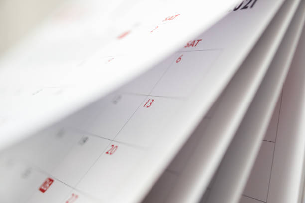 istock Abstract blur calendar page flipping sheet close up background business schedule planning appointment meeting concept 1324674556