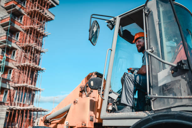 istock Smiling Bulldozer Driver Enjoying His Job 1324680029