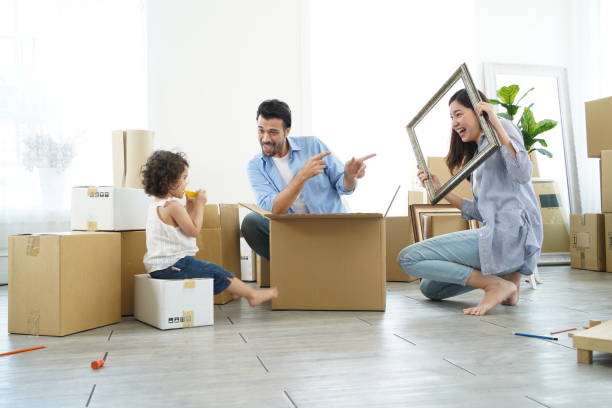 Happy family time. Family happiness on the day of moving house. mum new boyfriend stock pictures, royalty-free photos & images