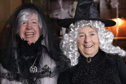 Spooky witches with gray hair.