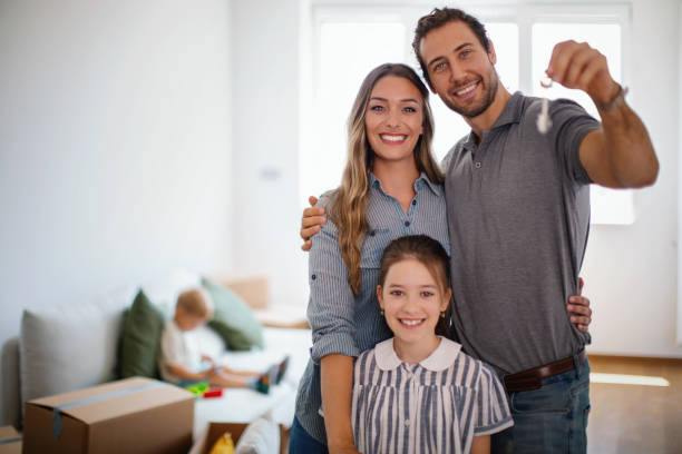 istock Family moving into a new apartment. 1324684768