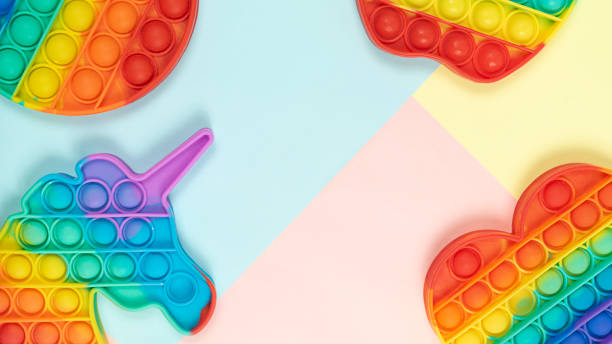 istock Pop it toys on pastel colorful background 1324686506