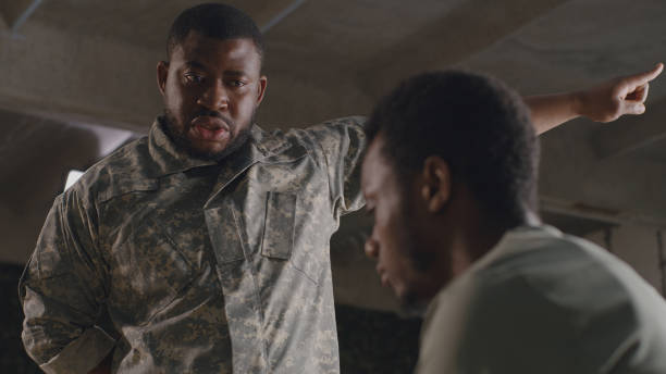 istock African American commander scolding soldier 1324687830