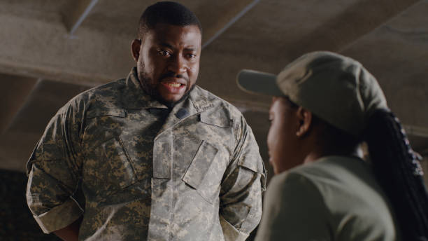 istock Black officer scolding female soldier 1324687861