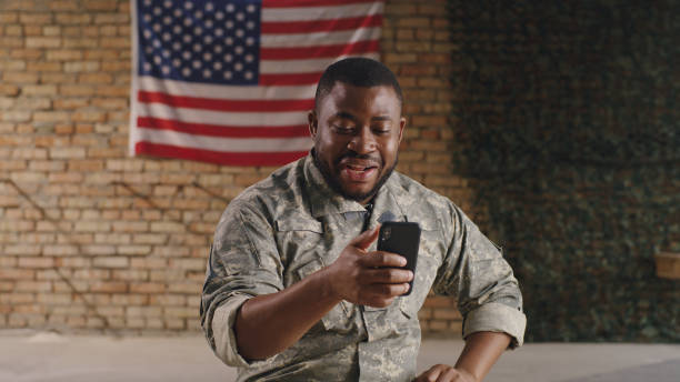 istock Black soldier making video call in gym 1324687866
