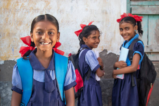 istock Indian Rural School Girls Standing in School 1324689295
