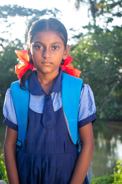 istock indian Rural School Girl Looking at camera 1324689435