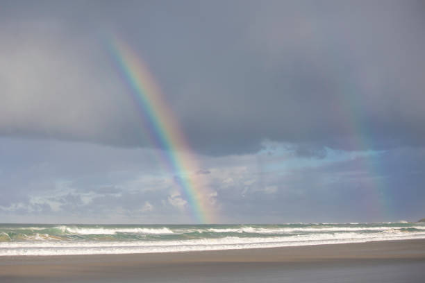 istock A bright and clear rainbow in a cloudy sky 1324691372