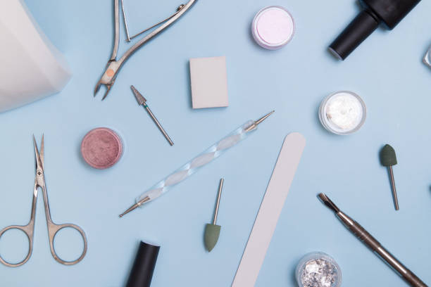 istock Tools and materials for manicure flat lay. Knolling nail care background 1324692682