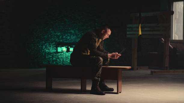 istock Male soldier making video call in gym 1324692937