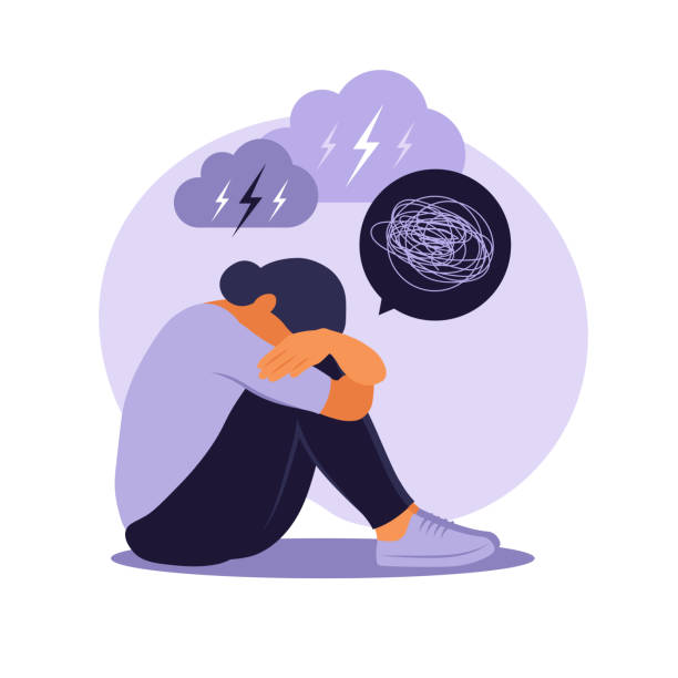 istock Woman in depression with bewildered thoughts in her mind. Young sad girl sitting in window and hugging her knees. Flat style 1324695767