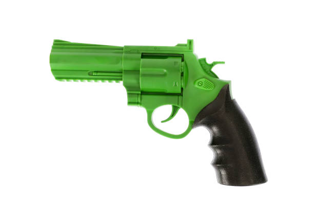 istock Green pistol with black handle, on white background, isolated image 1324697081