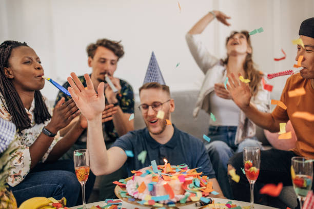 istock People celebrating friend's birthday 1324698182