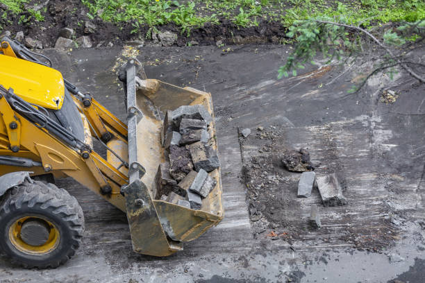istock Specialized bulldozer for road repair and paving. In action 1324700511