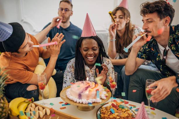 istock People celebrating friend's birthday 1324700981