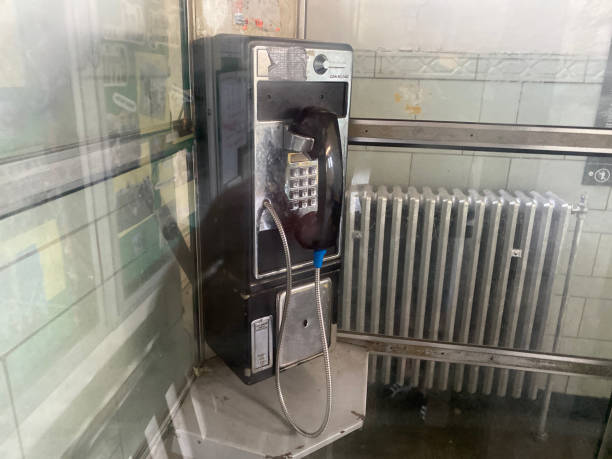 Old Payphone And Sewing Machine Behind A Shop Window Glass – Free Stock ...