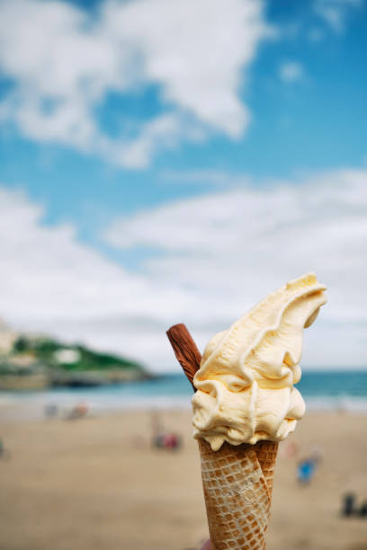 istock Ice Cream Cone above Towan Beach, Newquay, Cornwall on a June day. 1324708698