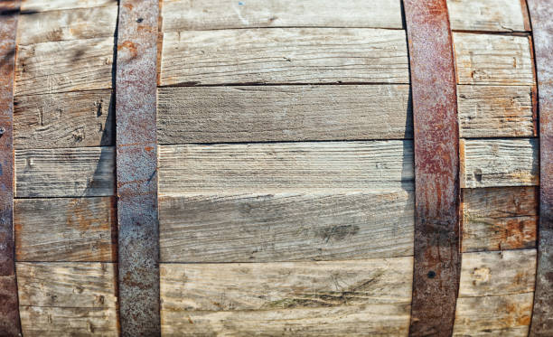 istock Wooden Barrel background. Vintage wine barrel texture, free space 1324709536