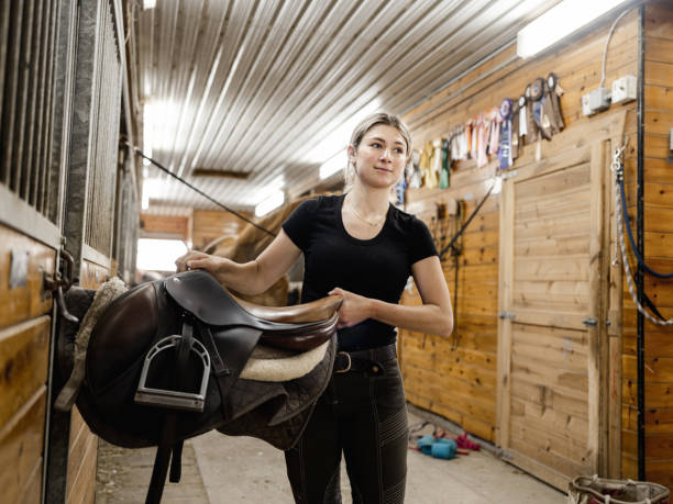 istock Young female trainer doing chores 1324709824
