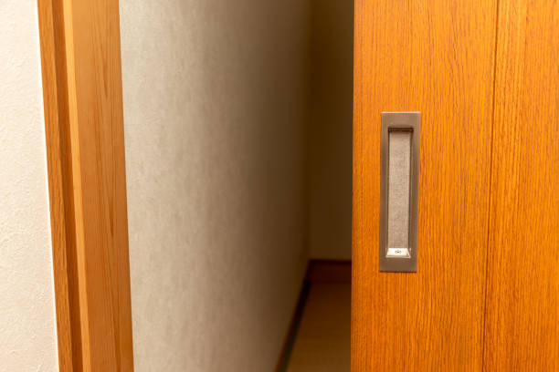 istock Open the sliding door and enter the dark room 1324710873