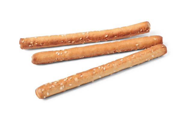 Bread sticks Bread sticks with sesame seeds isolated on white background breadstick stock pictures, royalty-free photos & images