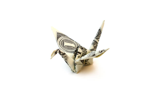 istock A folded dollar origami bird 1324713479