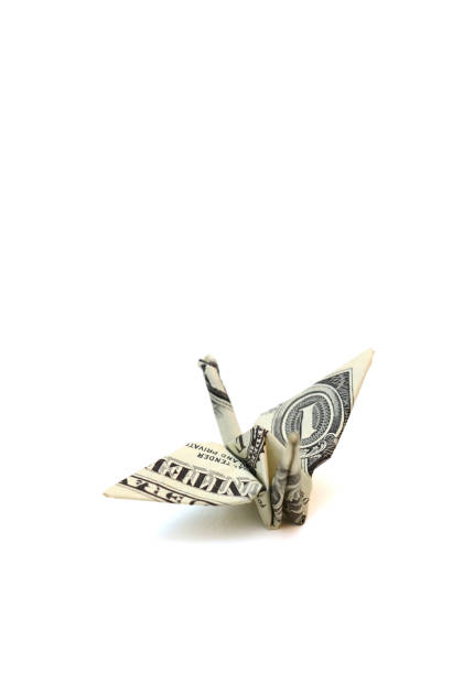 istock A bird origami dollar flying on landing 1324713488