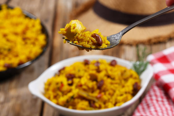 Puerto Rican Cuisine Close up of Puerto Rico and Dominican Republic cuisine of rice, chicken breast, plantain, and kidney beans a delicious savoury meal. High resolution 45Mp picture using Canon EOS R5 and various lenses puerto rican culture stock pictures, royalty-free photos & images