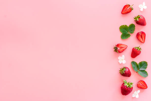 istock Layout of ripe strawberries with green leaves 1324715364