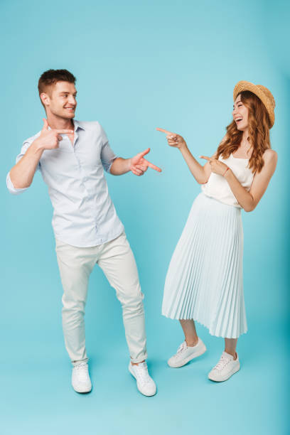 istock Caucasian loving couple pointing to each other 1324715455