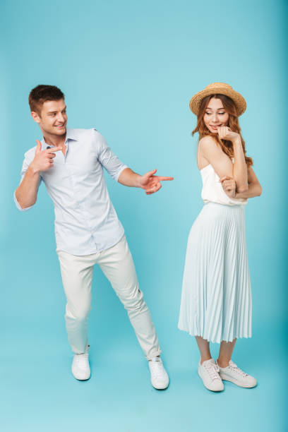 istock Caucasian man pointing to woman 1324715513