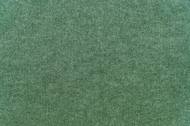istock Green synthetic wool carpet for background 1324718142