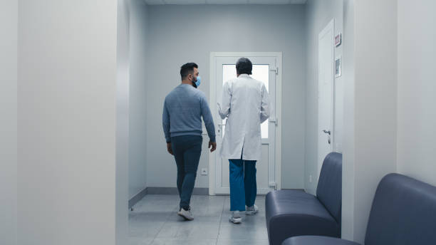 istock Doctor explaining diagnosis to patient in hospital 1324718498