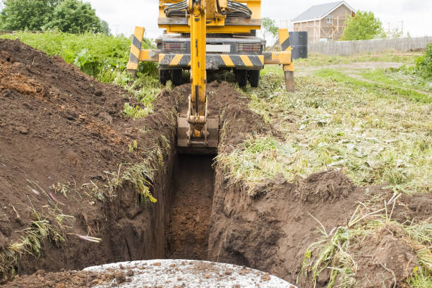 istock An excavator digs a trench for laying a water pipe 1324721172