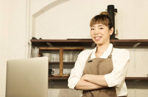 istock Asian small business owner portrait 1324722843