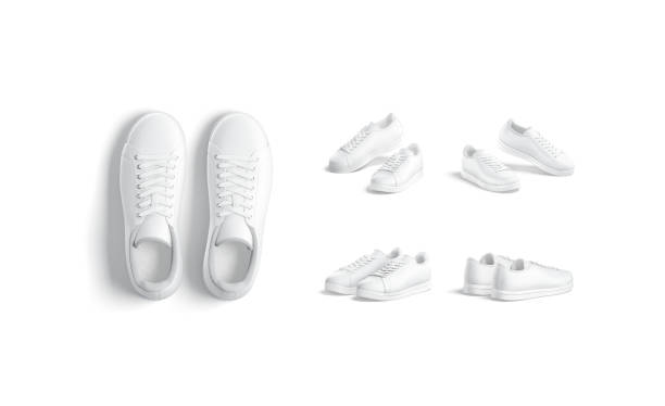 istock Blank white leather sneakers with lace pair mockup, different views 1324723254