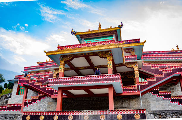 istock buddhist monastery with bright blue sky at morning from low angle 1324726116