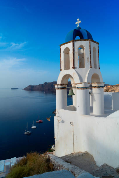 istock traditional blue dome with sea, Santorini 1324726989