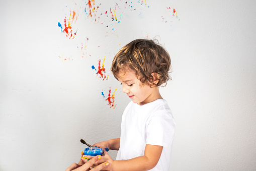 Boy Showing Colorful Paint on His Hands