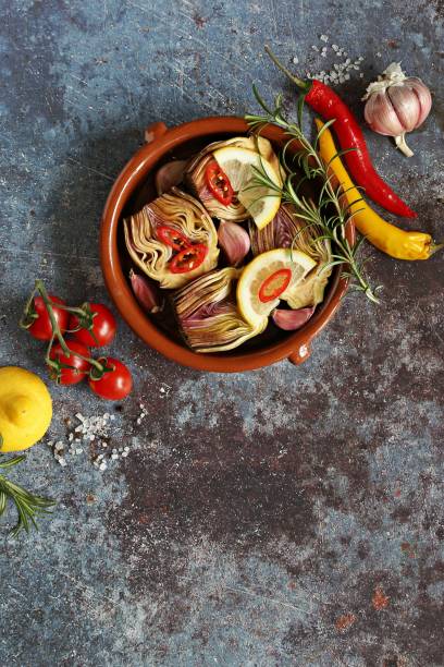 Roasted artichokes with lemon and herbs.